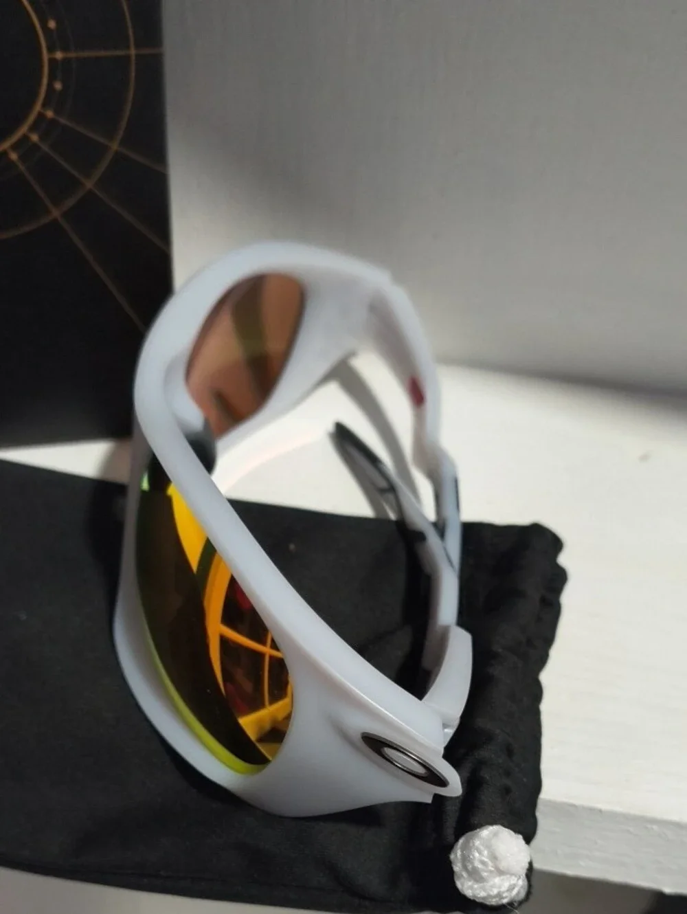 Oakley Clear Frame Sunglasses with Ruby-Red Polarized Lenses